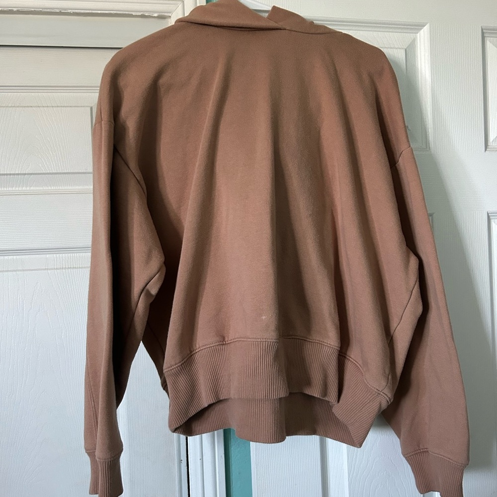 A brown cropped sweatshirt